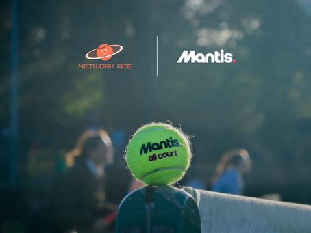 A Mantis All Court tennis ball balancing on the side of the net at a Network Ace session.