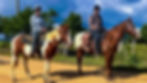 Guests arriving at San Lorenzo Farms after evening horseback ride in Belize