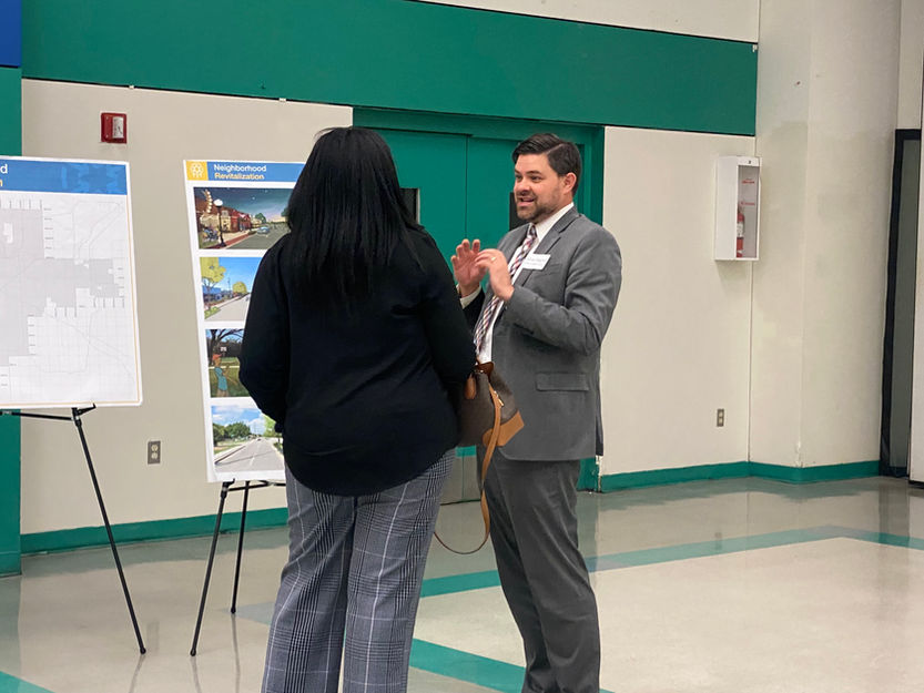 Department Director answering resident questions at the IOT3 Town Hall at the Greenwood Cultural Center 