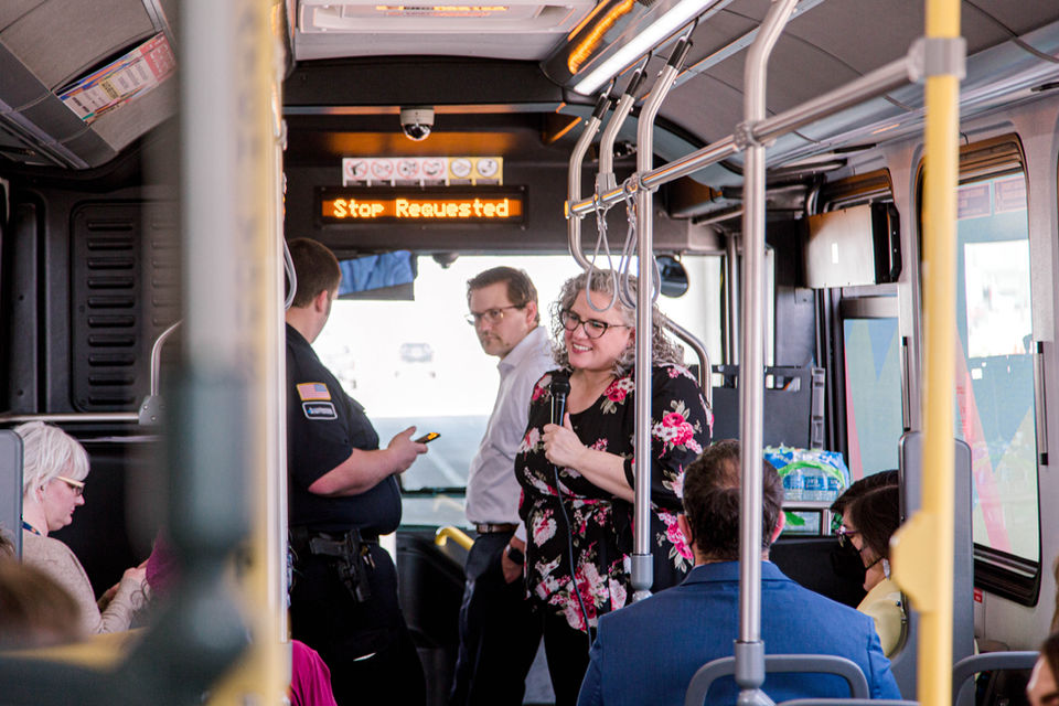 Councilor Lori Decter Wright on a city bus during a tour.