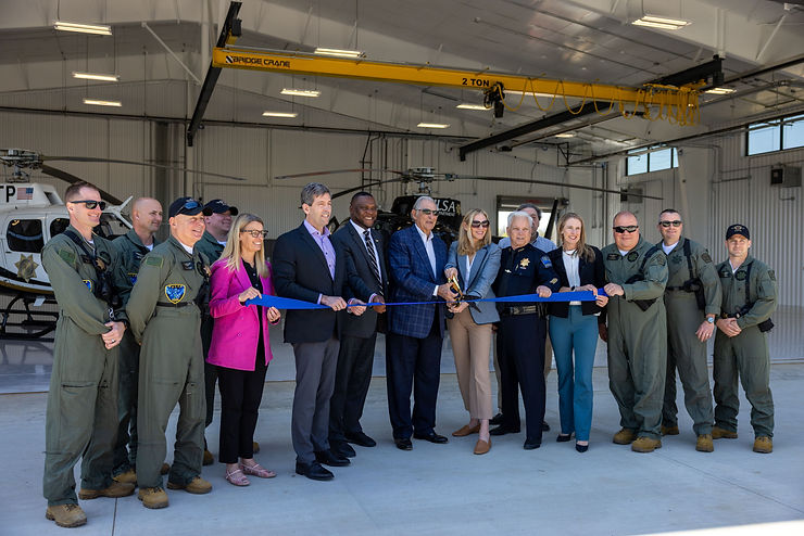 City leaders and Tulsa Police Department cut the ribbon on new Hardesty Hanger