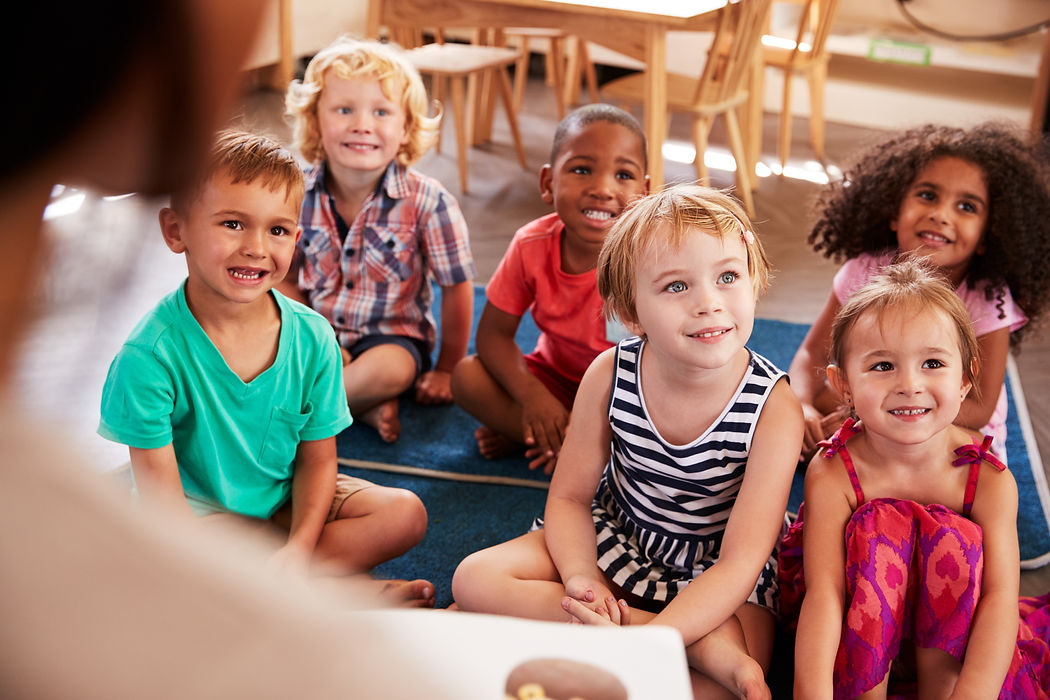 EinsteinSchoolofLearning_kidssitting.jpg