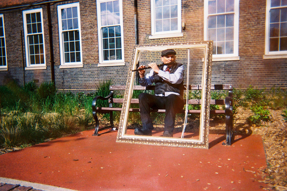 Flute Player in the Frame