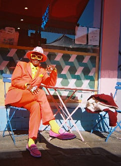 Man in front of cafe