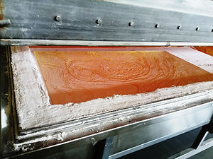Glass in a kiln turning red hot under the 820 degree temperature