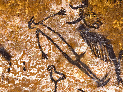 prehistoric cave painting of man with a bird head