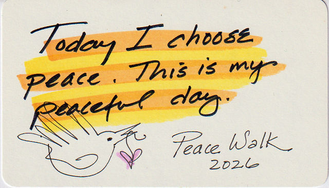 front of peace card with bird and "today I choose peace. this is my peaceful day." and "peace walk 2026