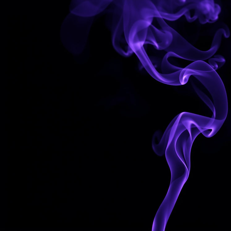 Purple smoke with a black background_edited.jpg