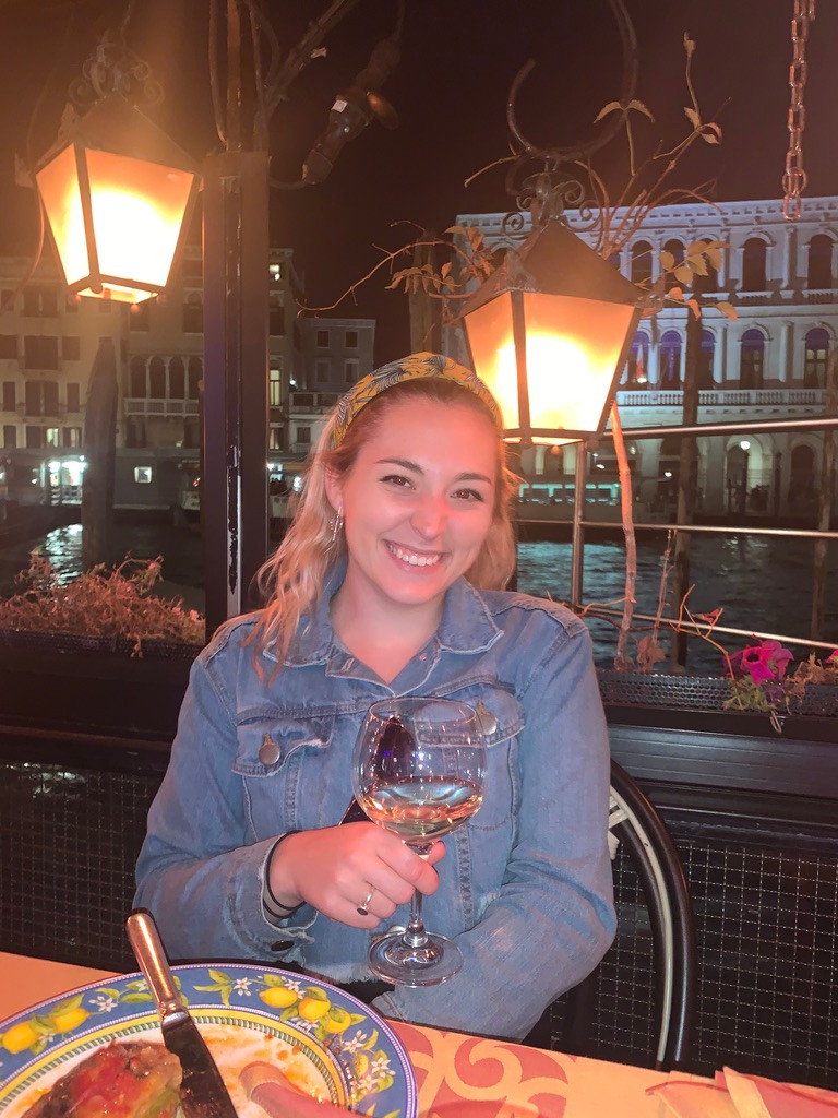 Alex eating dinner in Venice, Italy