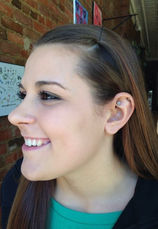 Photo of a customer with a rook piercing