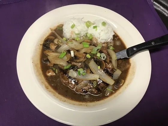 Order Smothered Hamburger Steak food online from Boudreaux's Louisiana Seafood And Steaks store, Saint Joseph on bringmethat.com