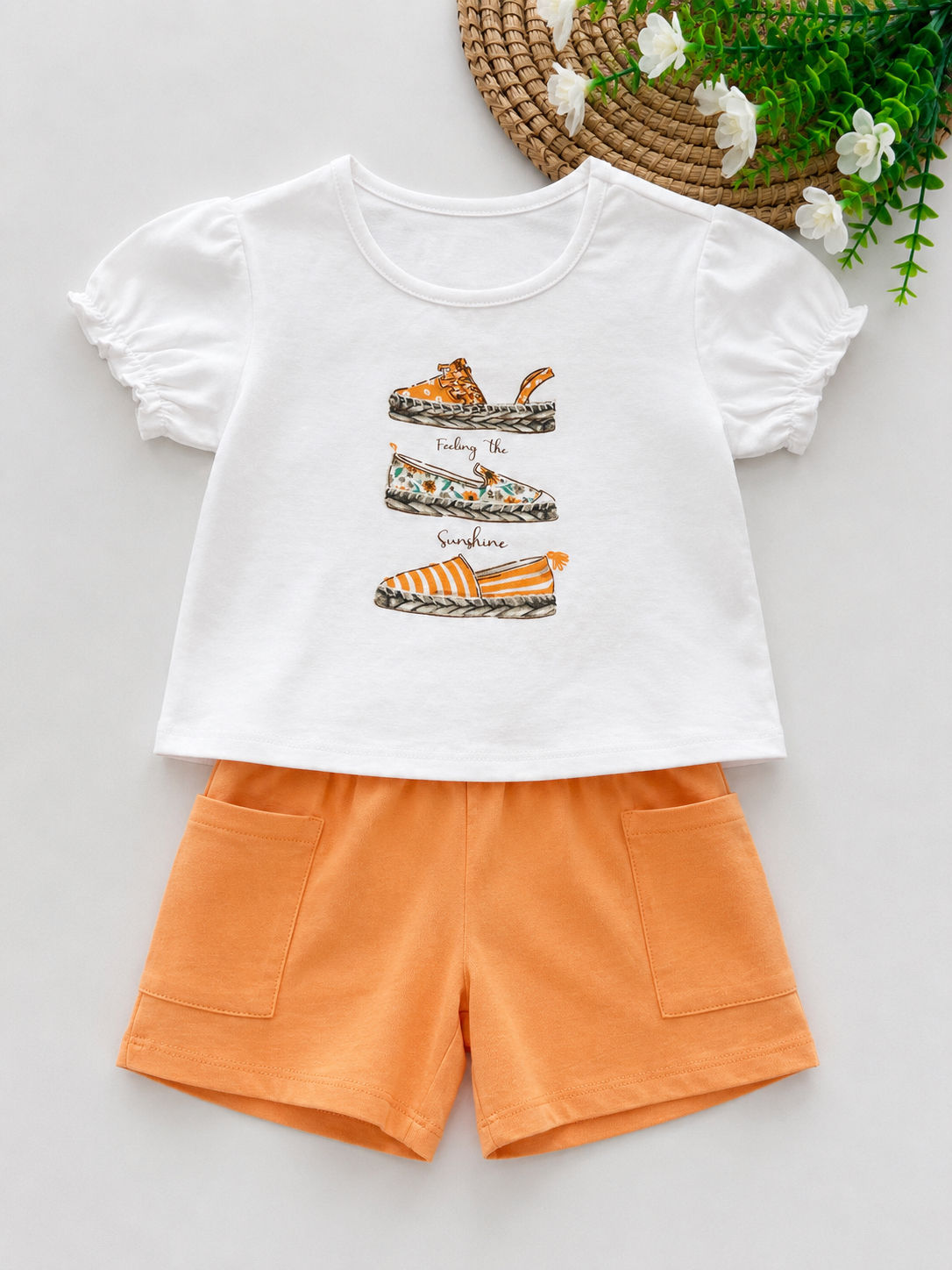 Completo bambina T-shirt e shorts arancio