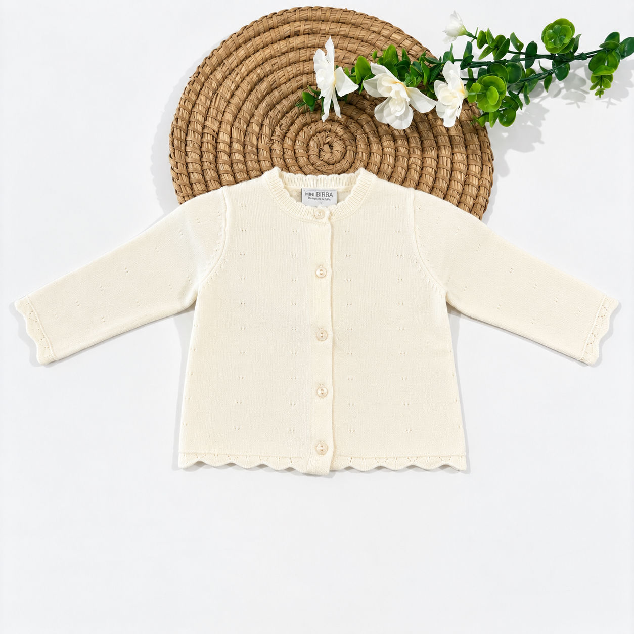 Cardigan neonata panna Mini Birba con lavorazione traforata