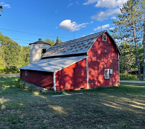 A red barn built in the 1950's