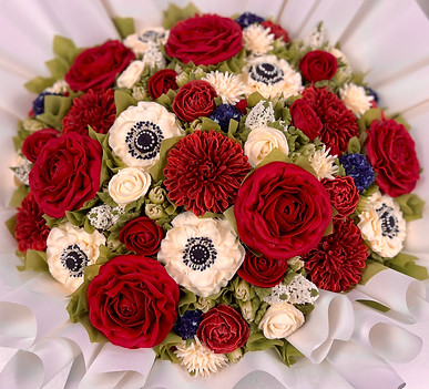 Large statement cupcake bouquet showstopper with 30 floral cupcakes for wedding dessert table in winter wedding colours