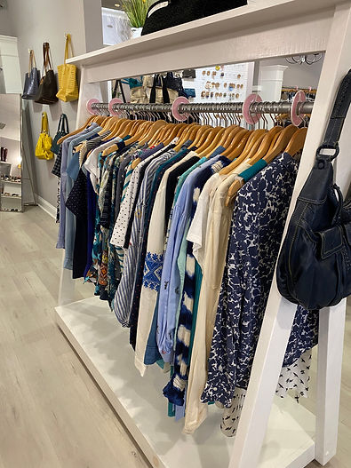 Designer consignment including Free People, Prada, Chanel and more