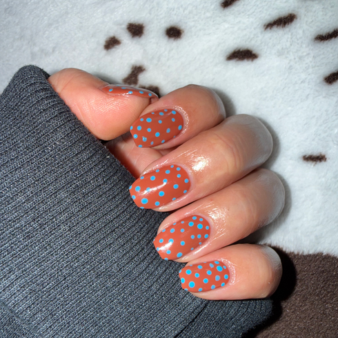 Symmetrical polka dot nail art