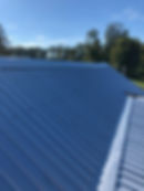 Close up of metal roof peak.