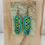 Thumbnail: Painted Leather Feather Earrings