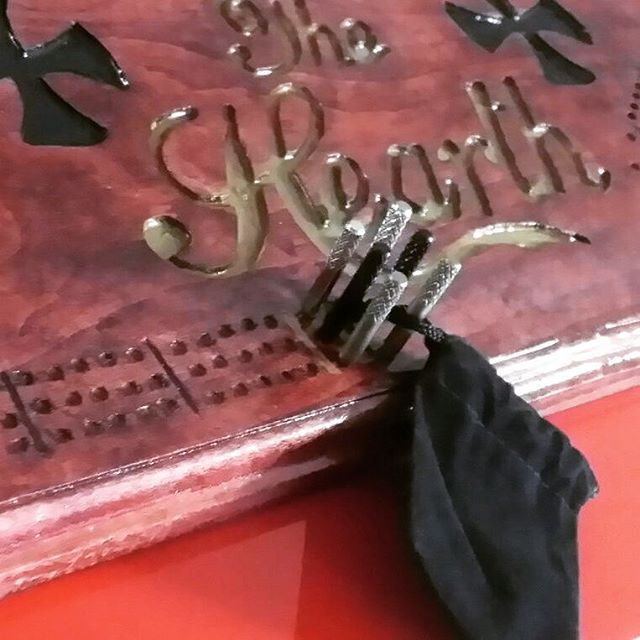 Our machined Metal pegs for our Custom Cribbage Boards