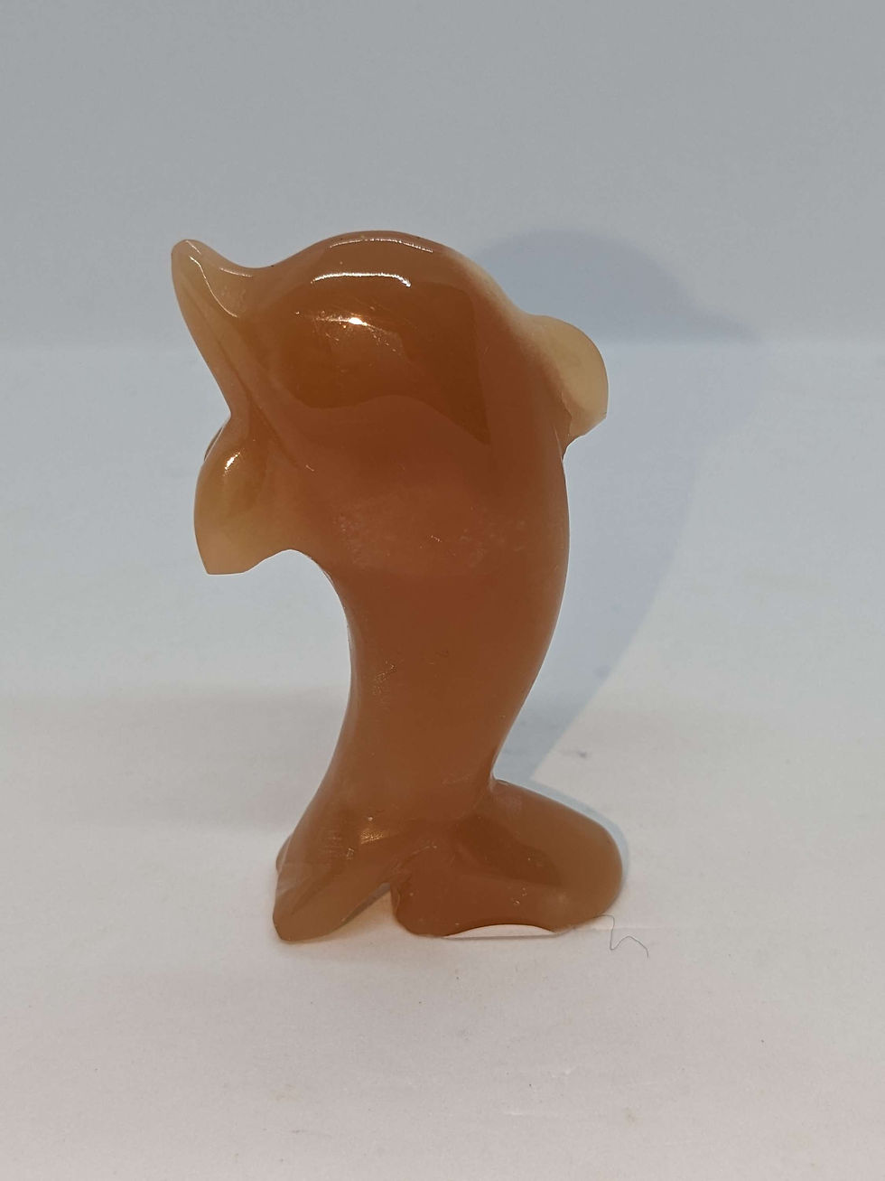 Thumbnail: Honey Calcite Dolphin