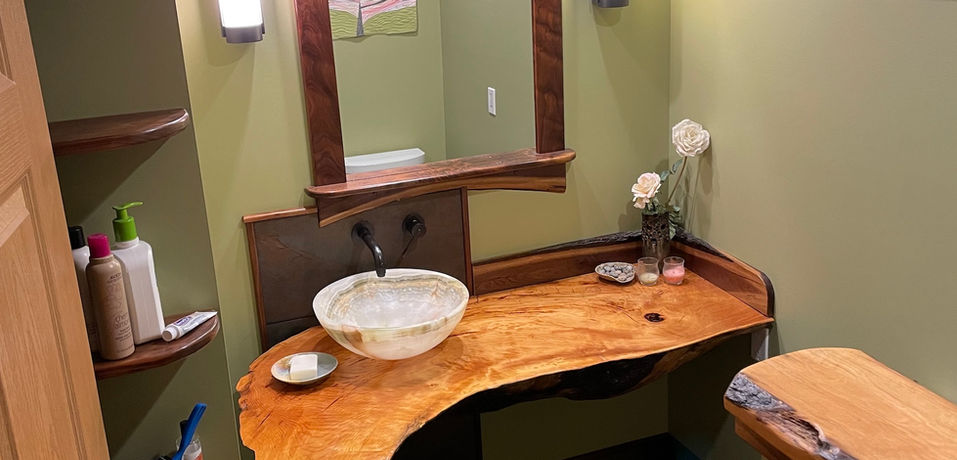 There is a half bath on the main floor of the house for guests