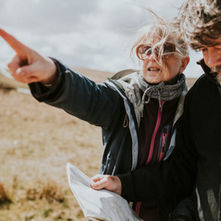 Couple navigating a map while lost