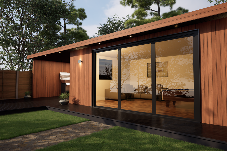 Red cedar cladded garden room with bifold doors
