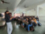 Creative Cognitive Institute speaker addressing students.