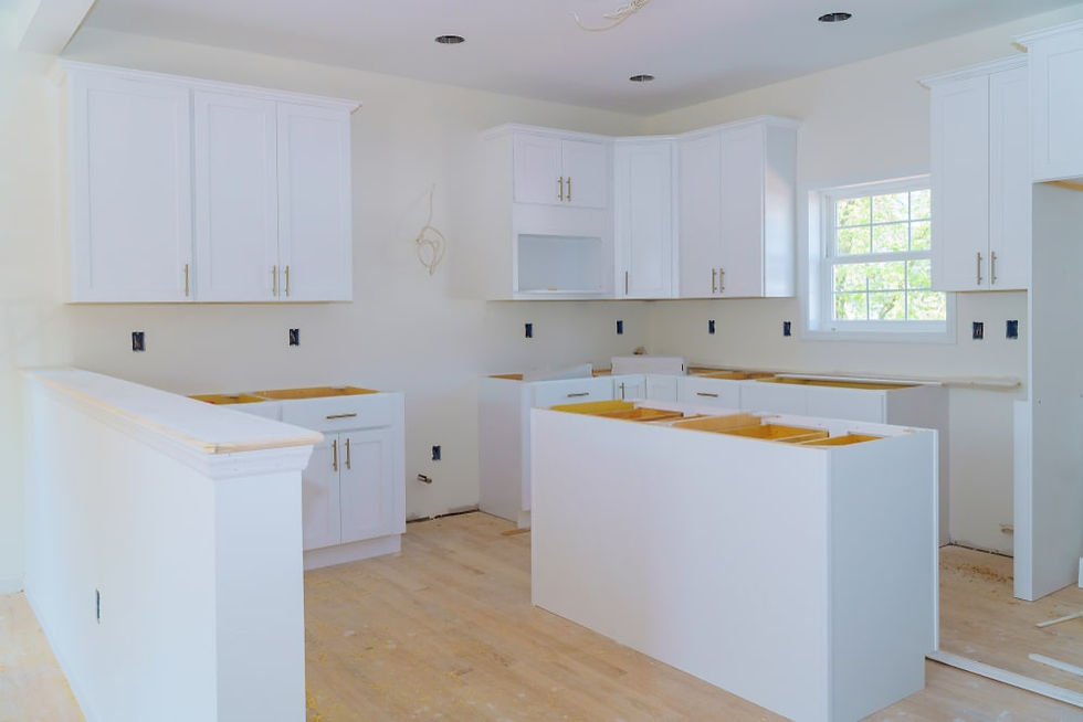 A bright white shaker style cabinet fully installed ready for countertops.