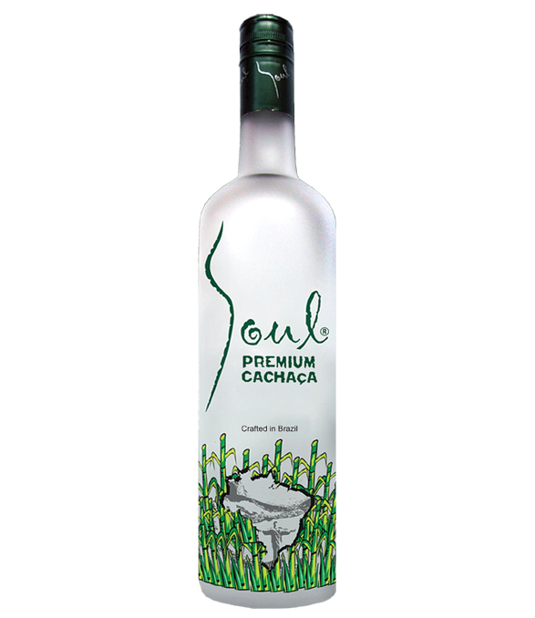 Bottle of Soul Premium Cachaca with two cocktails