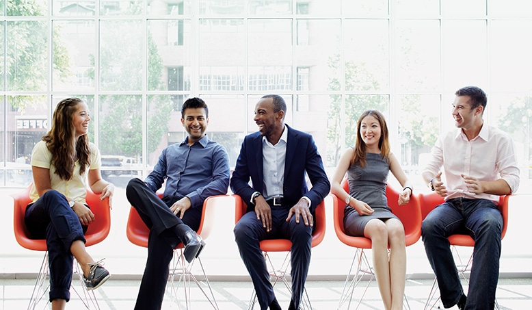 Black leader with multicultural team