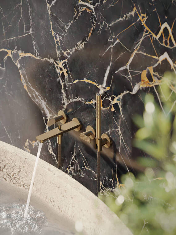 Antonio Citterio designed Citterio C Range faucet with water flowing. AXOR by Flow