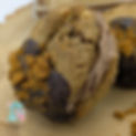 2 chocolate chip cookies sandwiched together with chocolate ganache