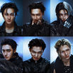 6 members of K-pop group ENHYPEN: Jungwon, Jay, Jake, Sunghoon, Sunoo, Ni-ki wearing leather jackets and silver jewelry, including fangs