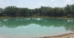 Check out the results of this tank cleaning job in Uvalde County, Texas! Can't you see yourself sinking a line in this beauty?!