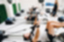 People on reformer machines at Wave Reformer Pilates Mona Vale