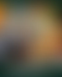 Overhead shot of tacos and nachos on a table with a Jarritos Mexican Soda