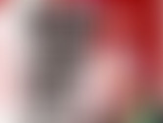 red and white background with someone holding a stack of chips