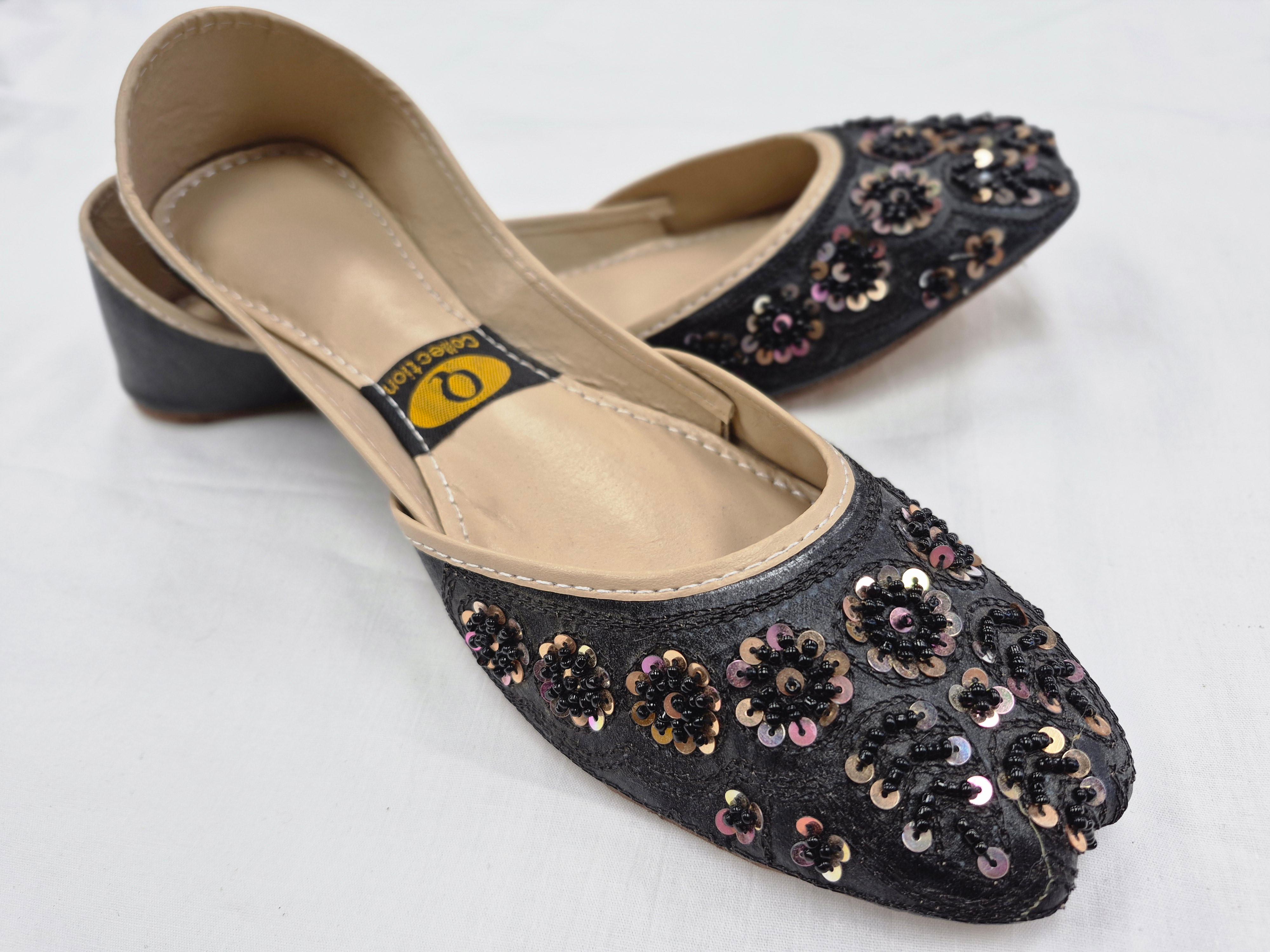 Handcrafted black jutti flats with floral designs