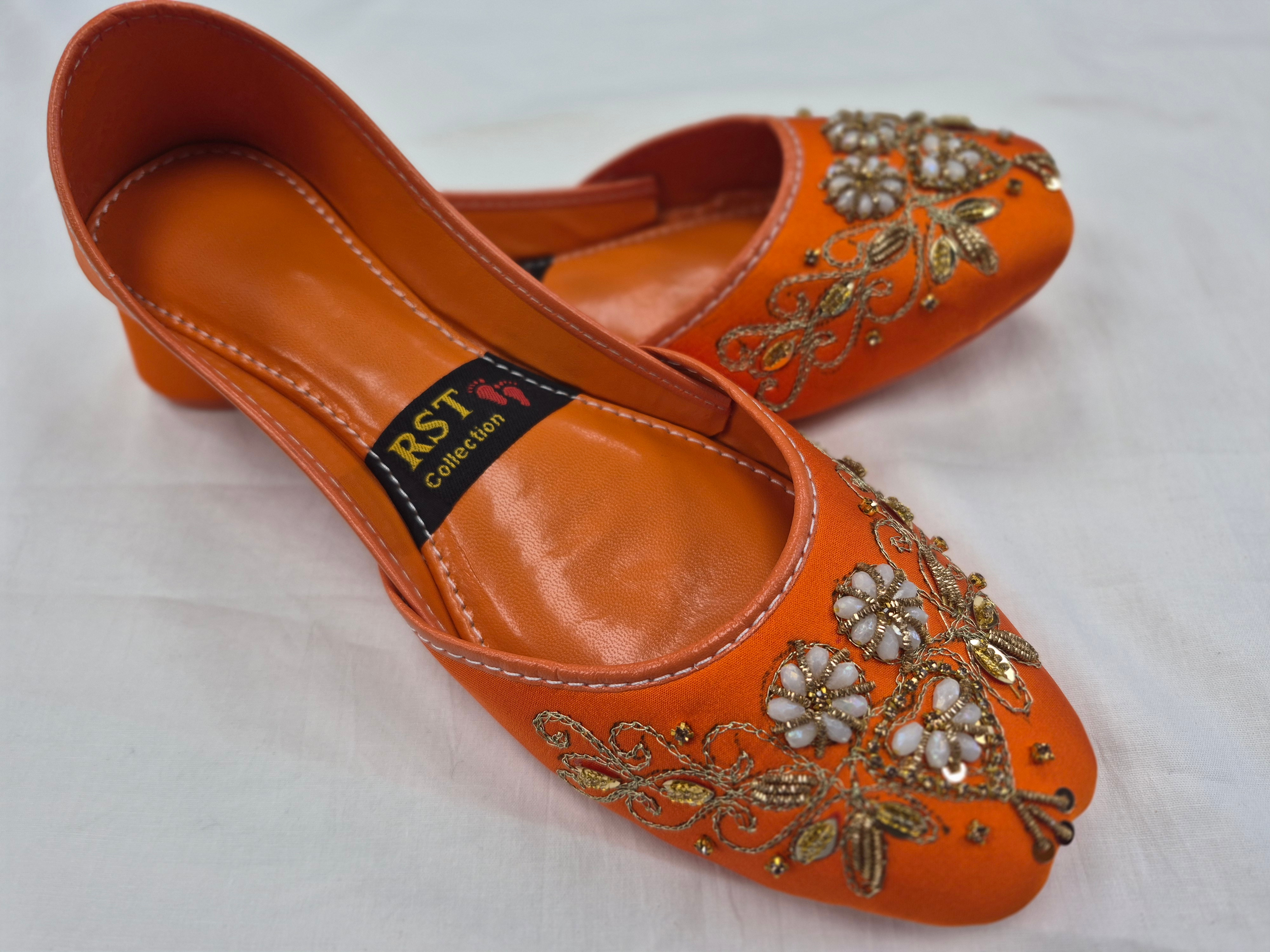 Deep orange embroidered khussa shoes from RST Collection