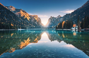 lake-in-fog-with-reflection-of-mountains-at-sunris-2021-08-28-00-48-41-utc.jpg