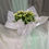 Thumbnail: White Kalanchoe plant with silver bow and decorative wrap