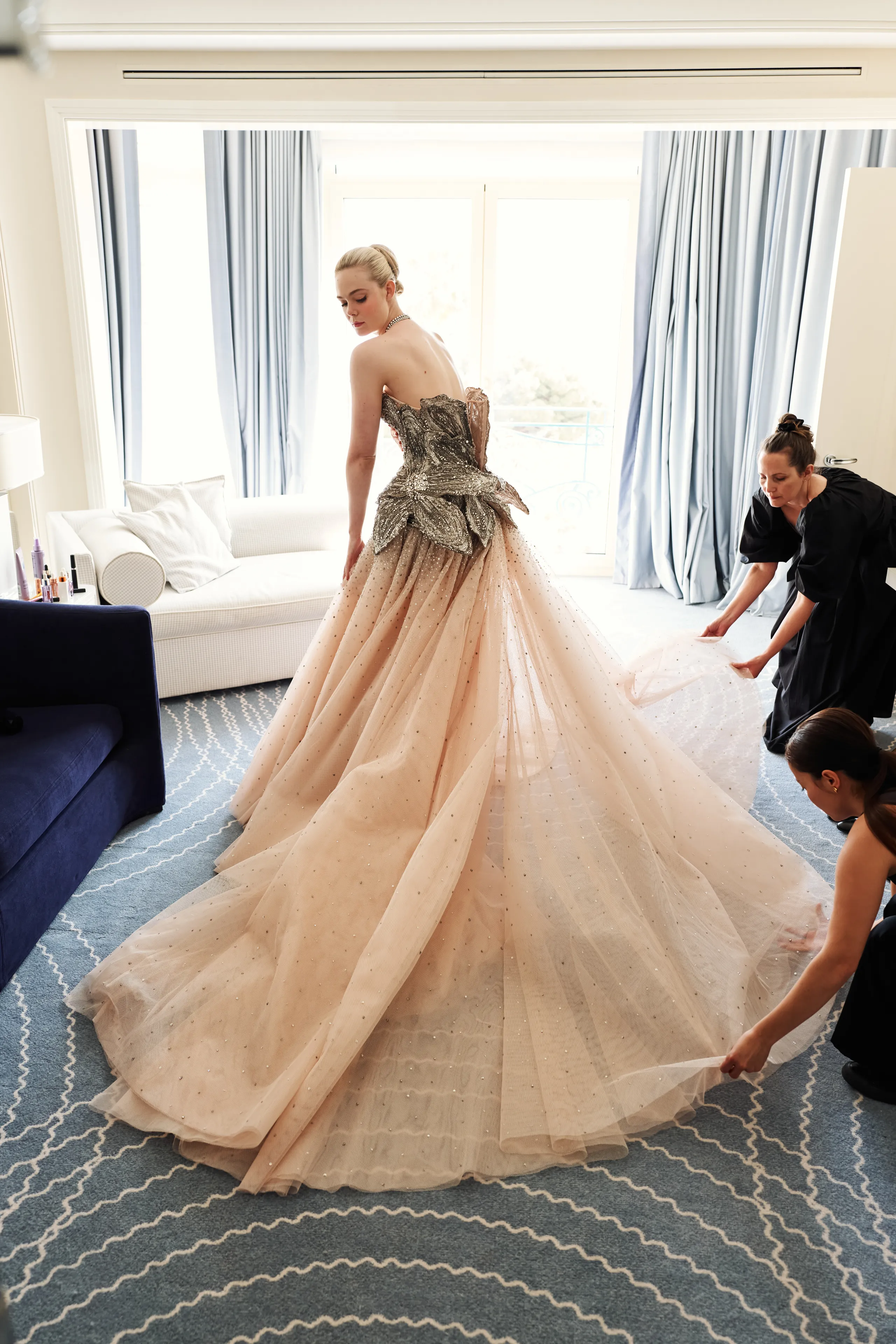 Elle Fanning Getting Ready for the Cannes Film Festival wearing Alexander McQueen