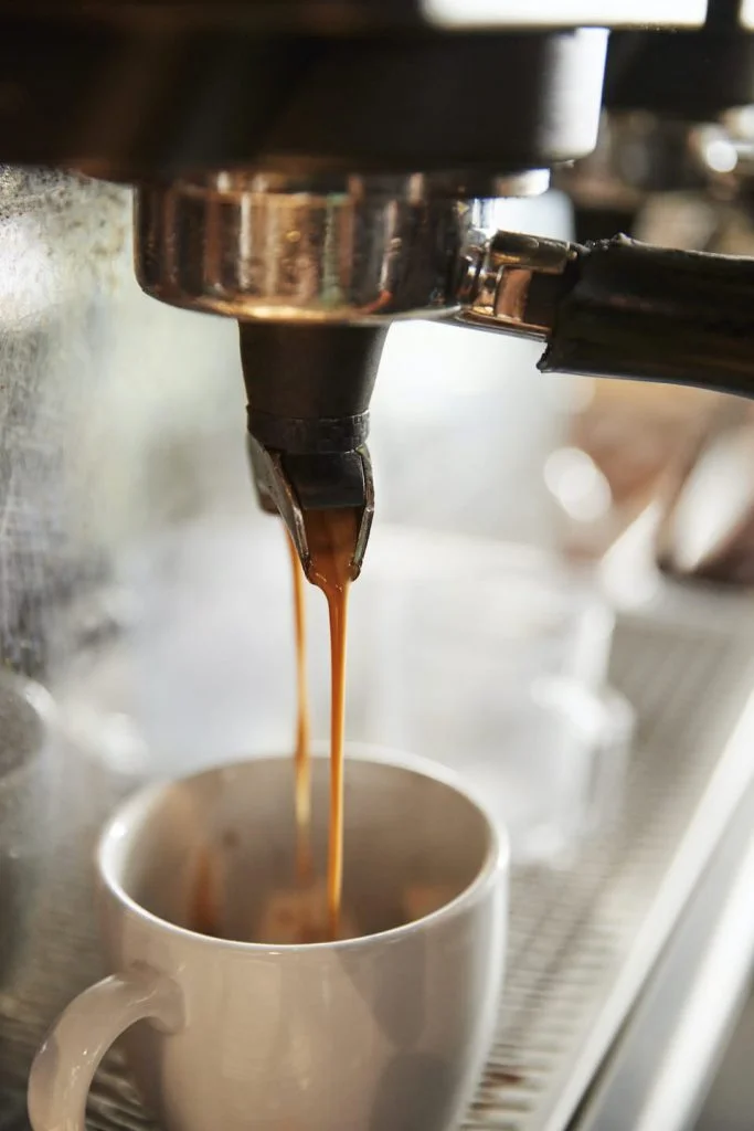 close-up-of-coffee-machine-in-cafe-PUW782D-683x1024.jpg