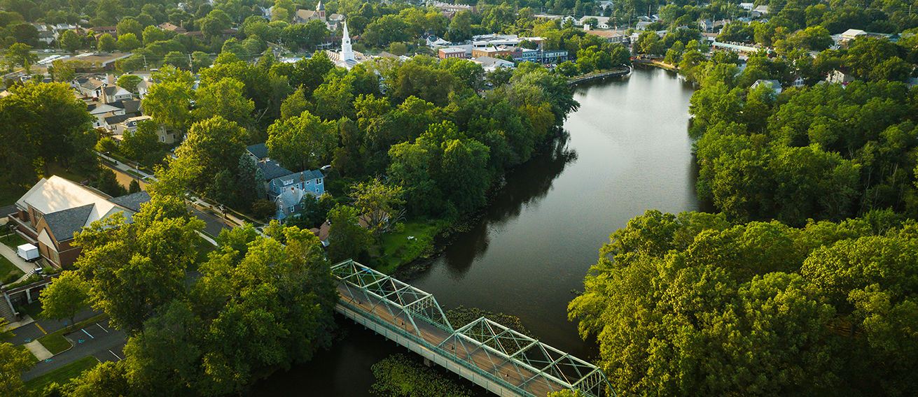 Aerial view of Hightstown, Peddie Lake and downtown with no people visible