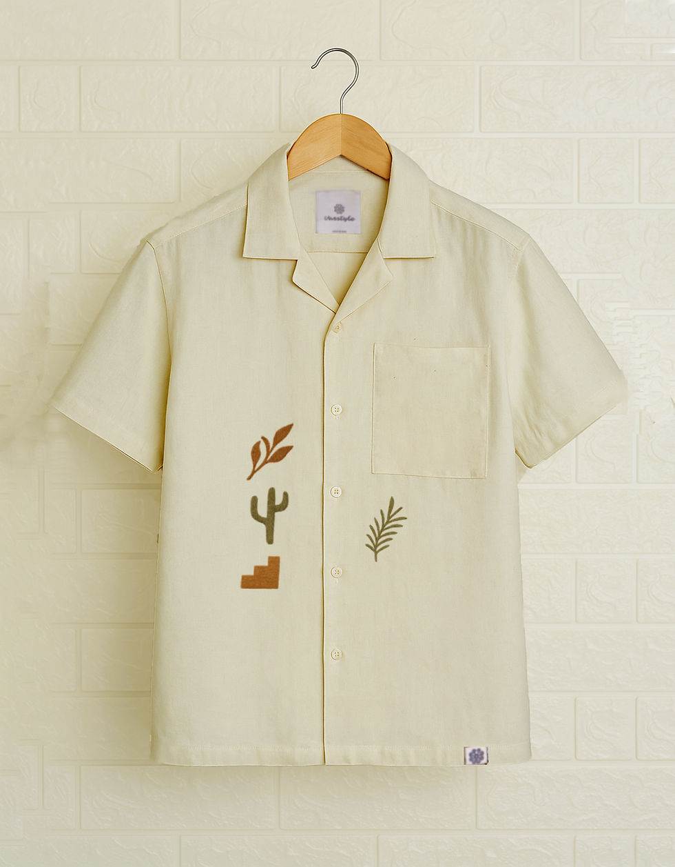 Off-white linen half-sleeve shirt with minimal desert cactus and leaf embroidery