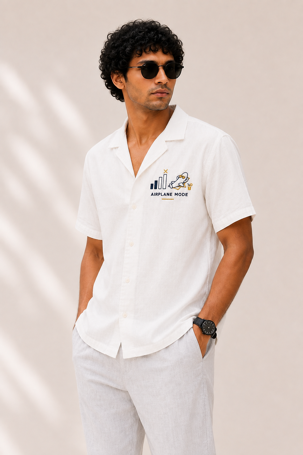 Men's embroidered resort collar shirt in off-white cotton linen three-quarter view