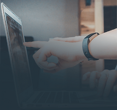 Pointing at a screen with a scale icon overlay