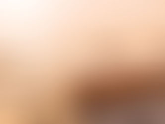 Cardboard casket on a sandy beach at sunset in New Zealand